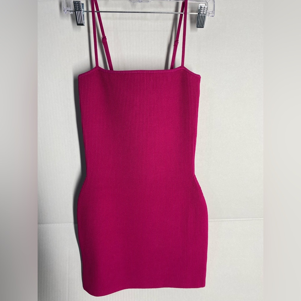 - Rib-knit mini dress by Aritzia